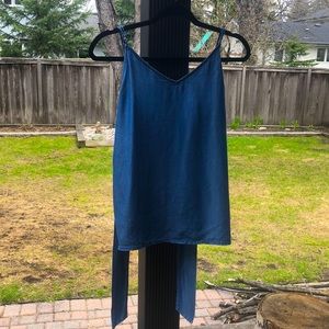 Blue, medium sized “1250 degrees Celsius” tank top. New condition.
